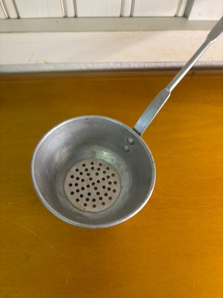 small vintage aluminum strainer