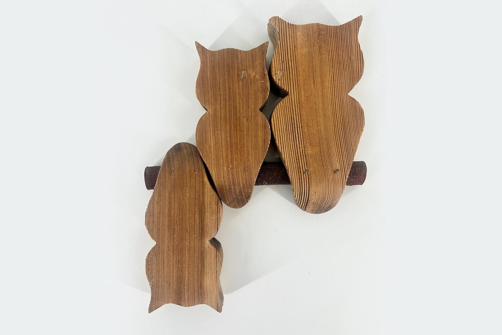 Three wooden owls