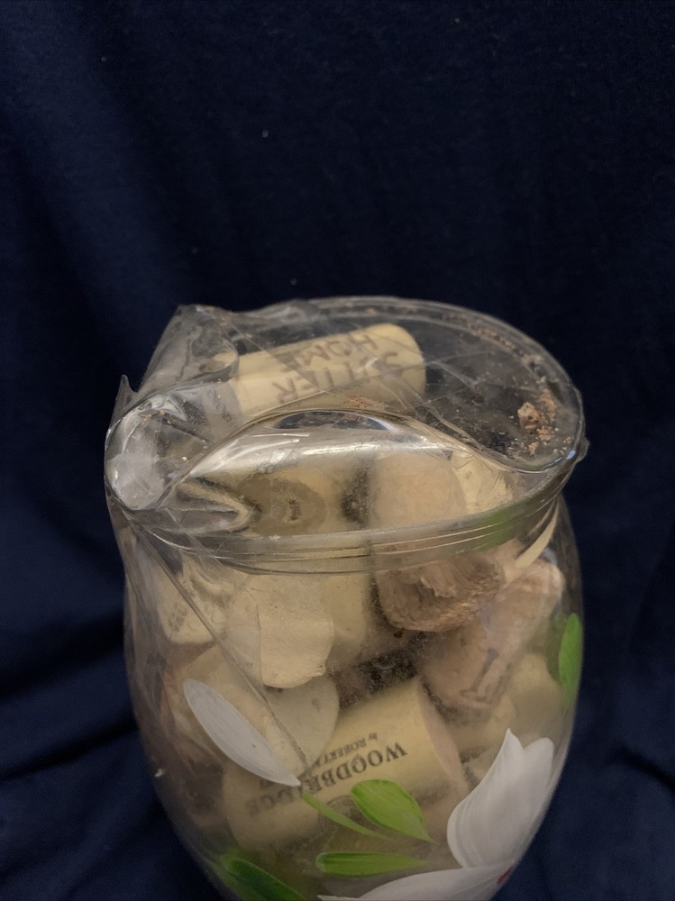 Wine Bottle Corks In Hand Painted Pitcher