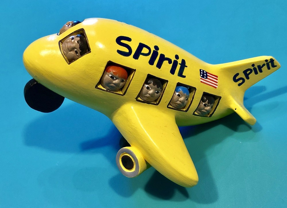 SPIRIT AIRLINES HAND PAINTED CERAMIC PLANE
