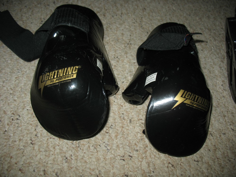 Used Lightning by ProForce Boxing Protective Gear for Head and Hands.