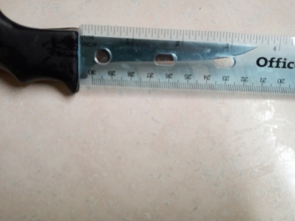 Unique NATURAL-CURV deboning knife. Wrap around rubber handle.