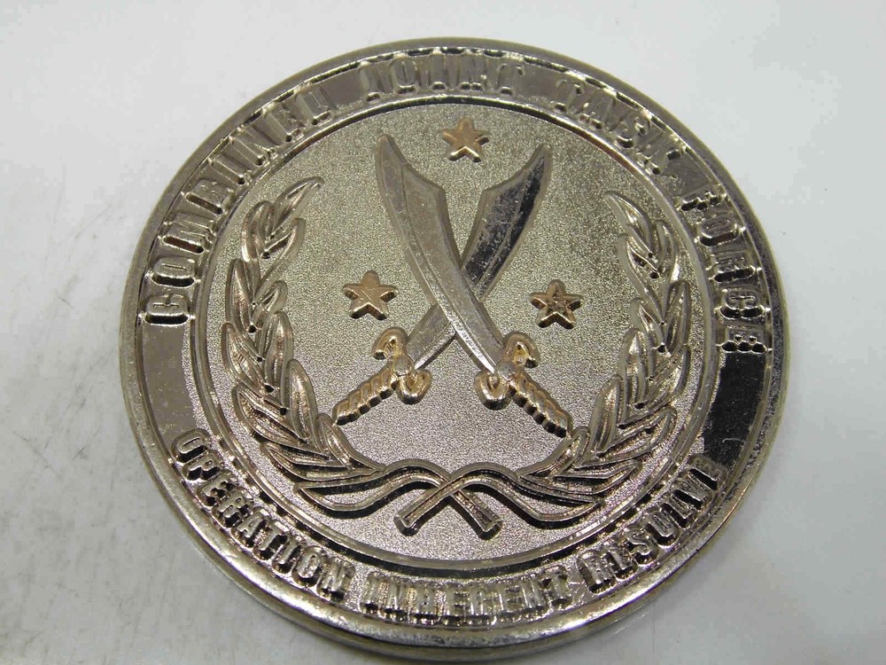 ONE MISSION MANY NATIONS CHALLENGE COIN