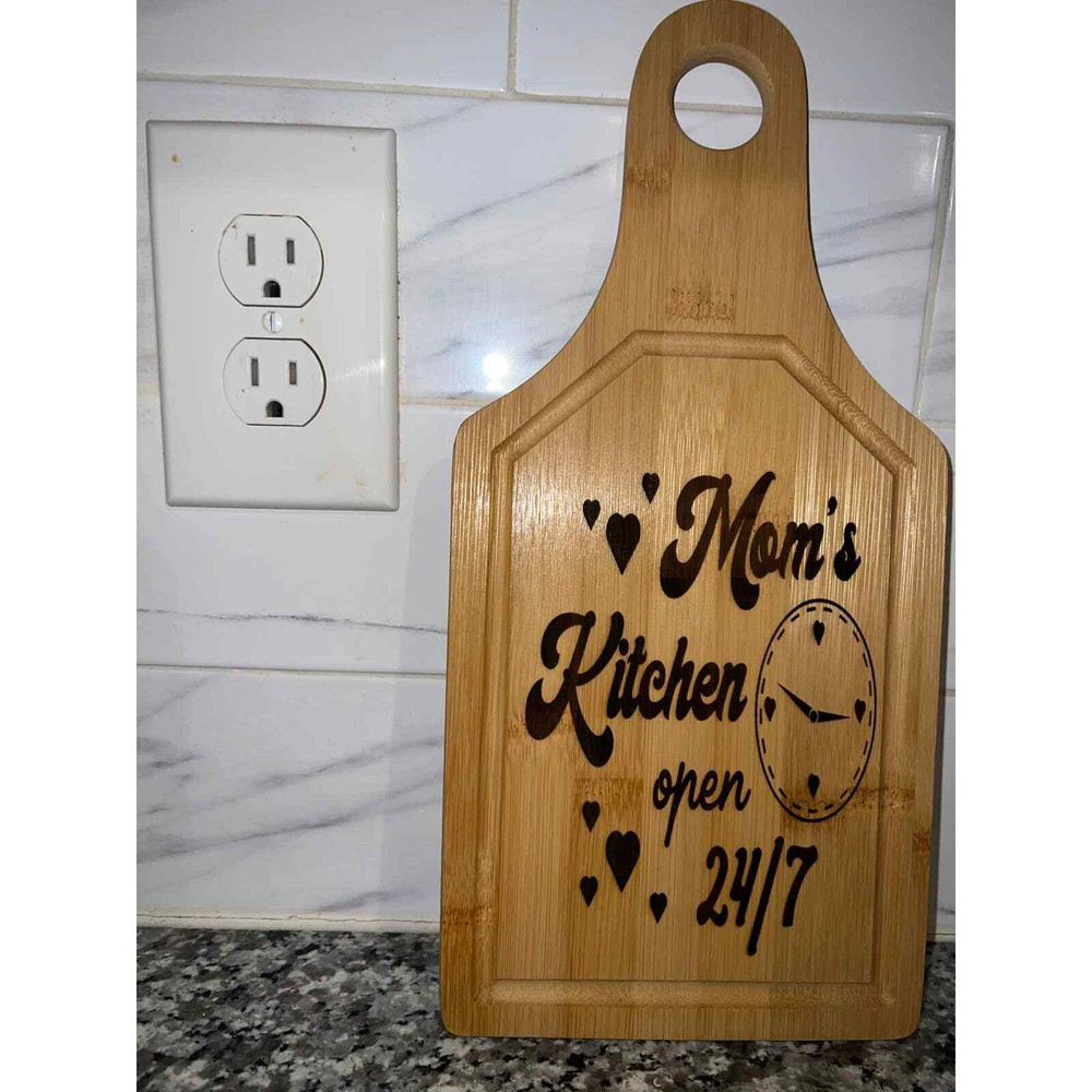 "Moms Kitchen Open 24/7": 12" x 6" Bamboo Engraved Cutting Board