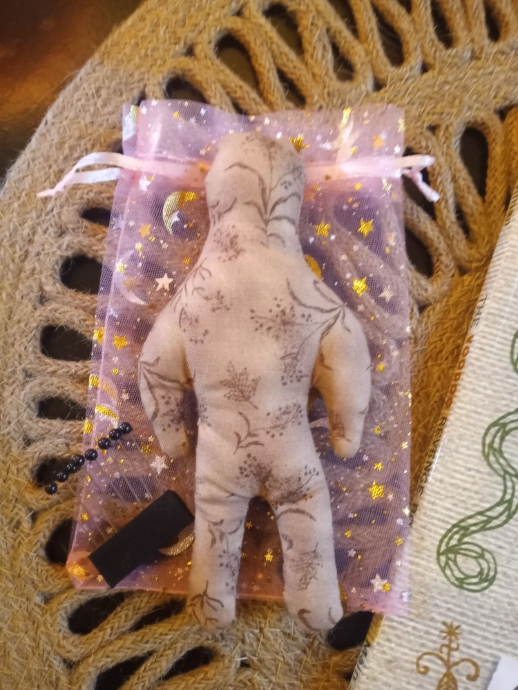 voodoo doll and book by Mark Schulman