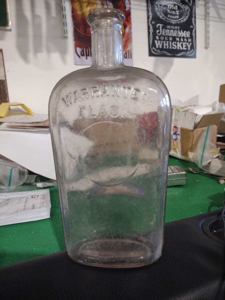 ANTIQUE GLASS BOTTLE WARRANTED FLASK SIDE STRAP BOTTLE