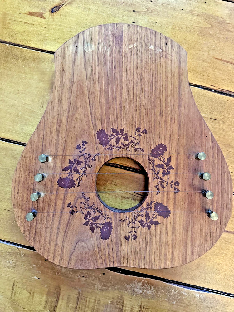 Rustic Floral Wooden String Instrument