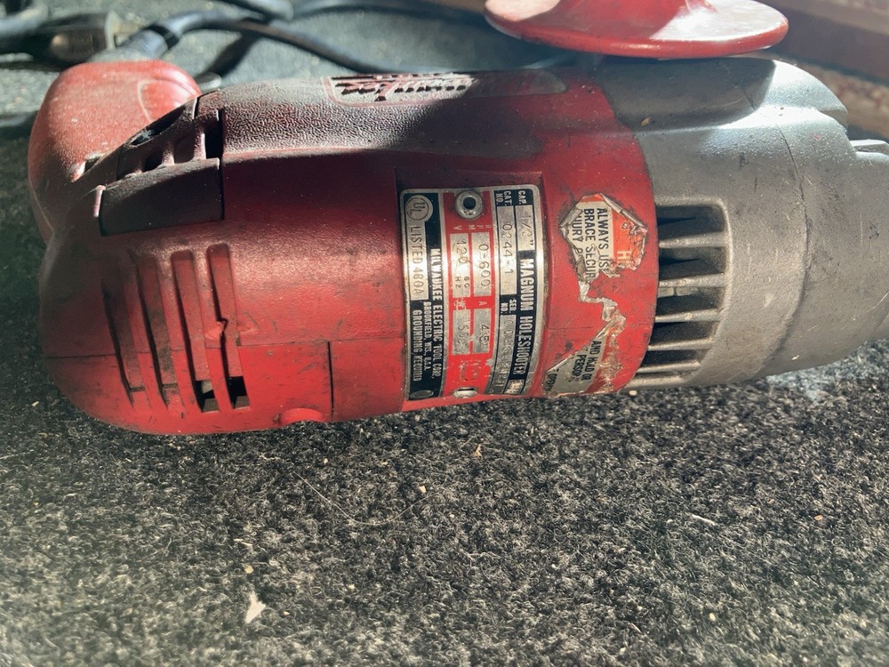 Milwaukee Electric Drill with Side Handle Attachment