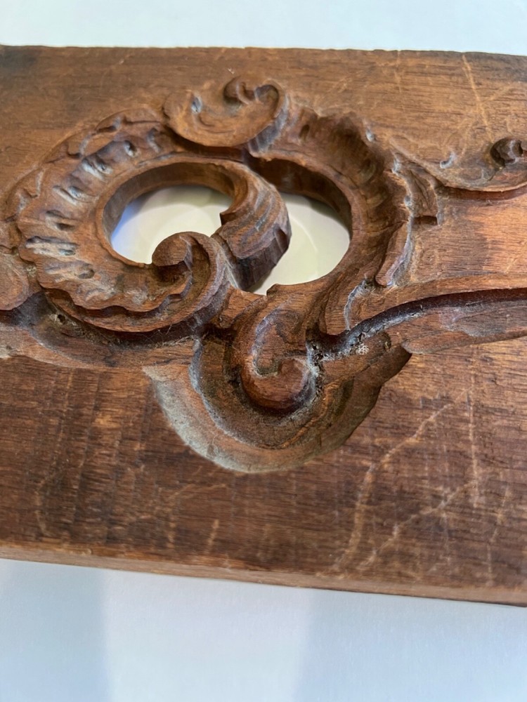 salvaged antique carved board