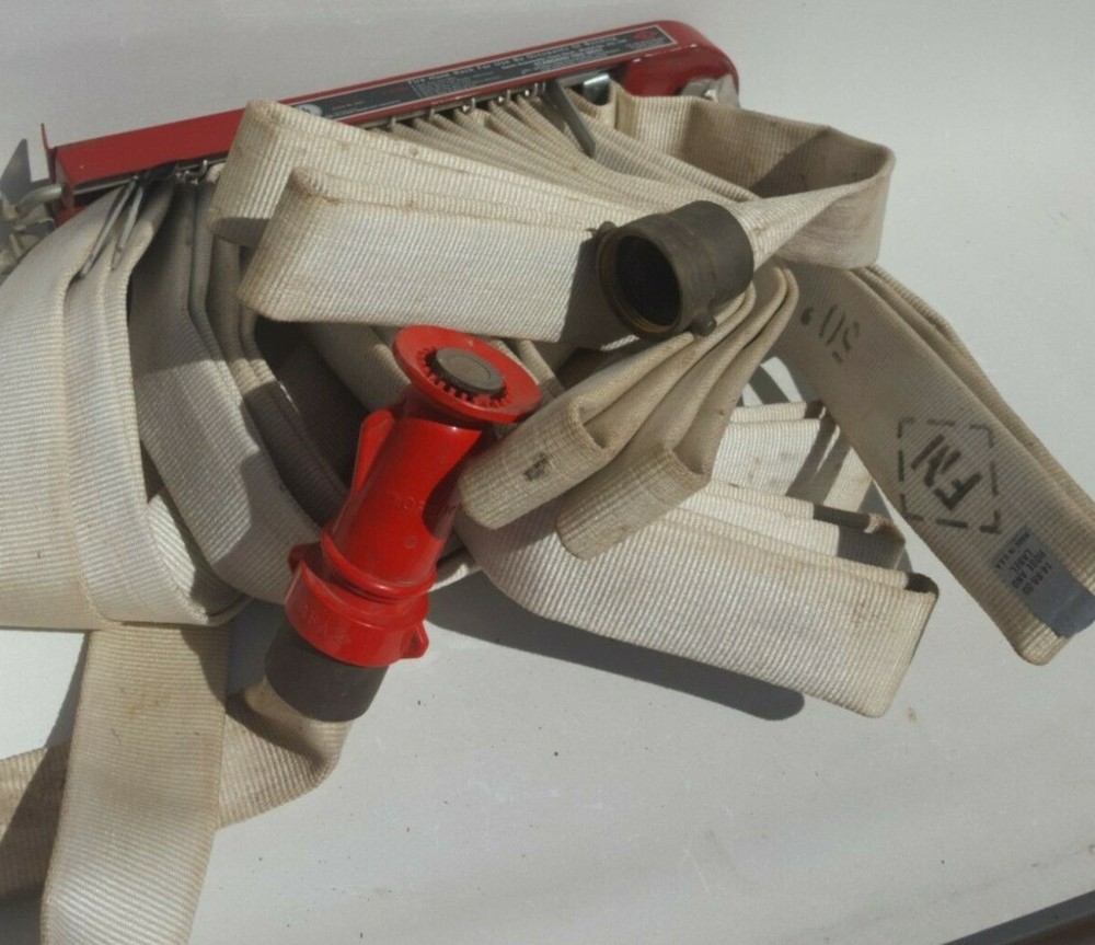 F-M Fireman Hose Rack with Fire Hose.