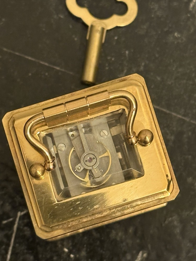 Bronze miniature carriage clock with a silver plated front
