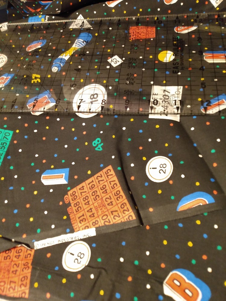 Bingo on black cotton quilting fabric