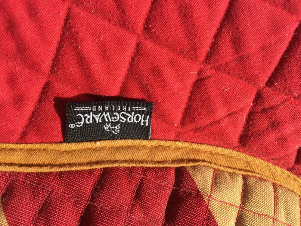 All Purpose Red/Multicolored Shaped Saddle Pad with Wither Padding