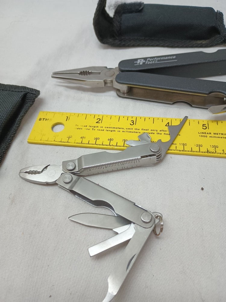 LOT OF 2 MULTI-TOOLS