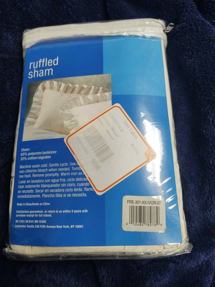 Ivory Solid Ruffled Standard Pillow Sham