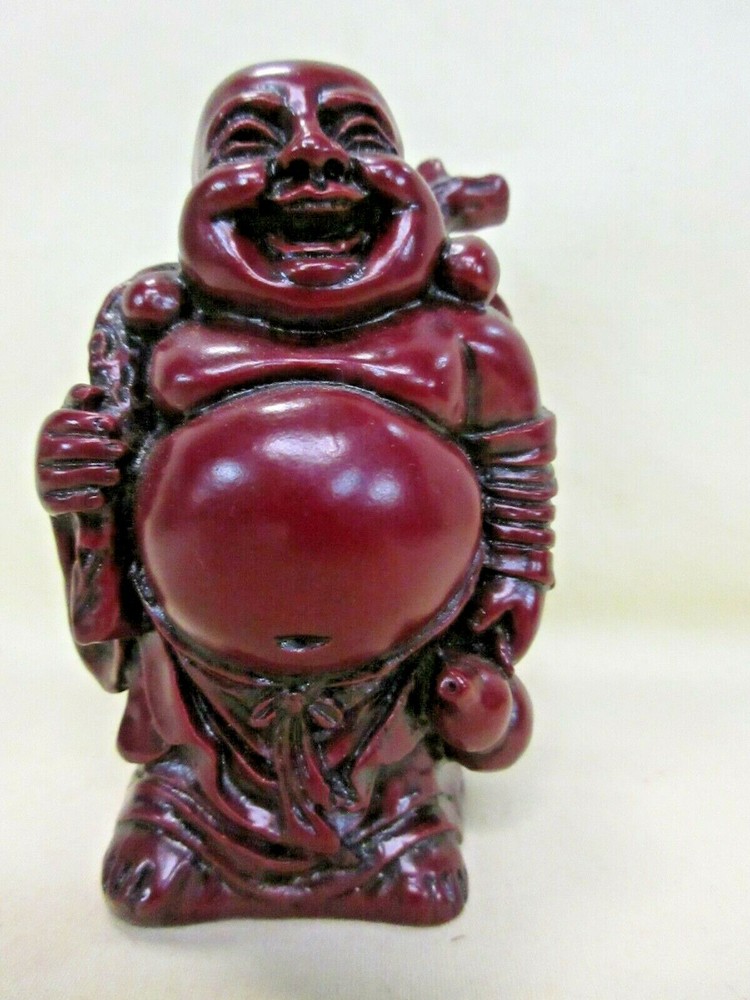 CHINESE RED POLY RESIN BUDDHA MAN