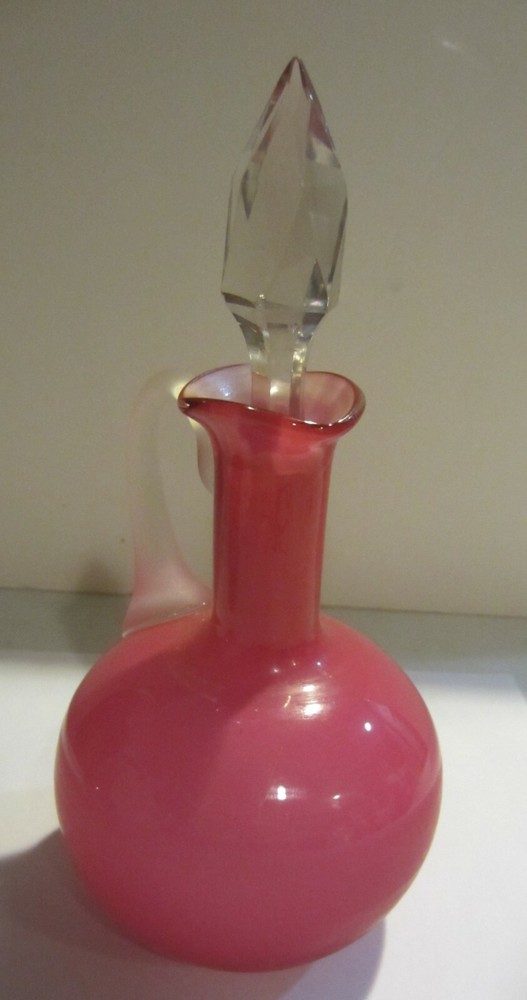 Frosted cranberry color perfume bottle