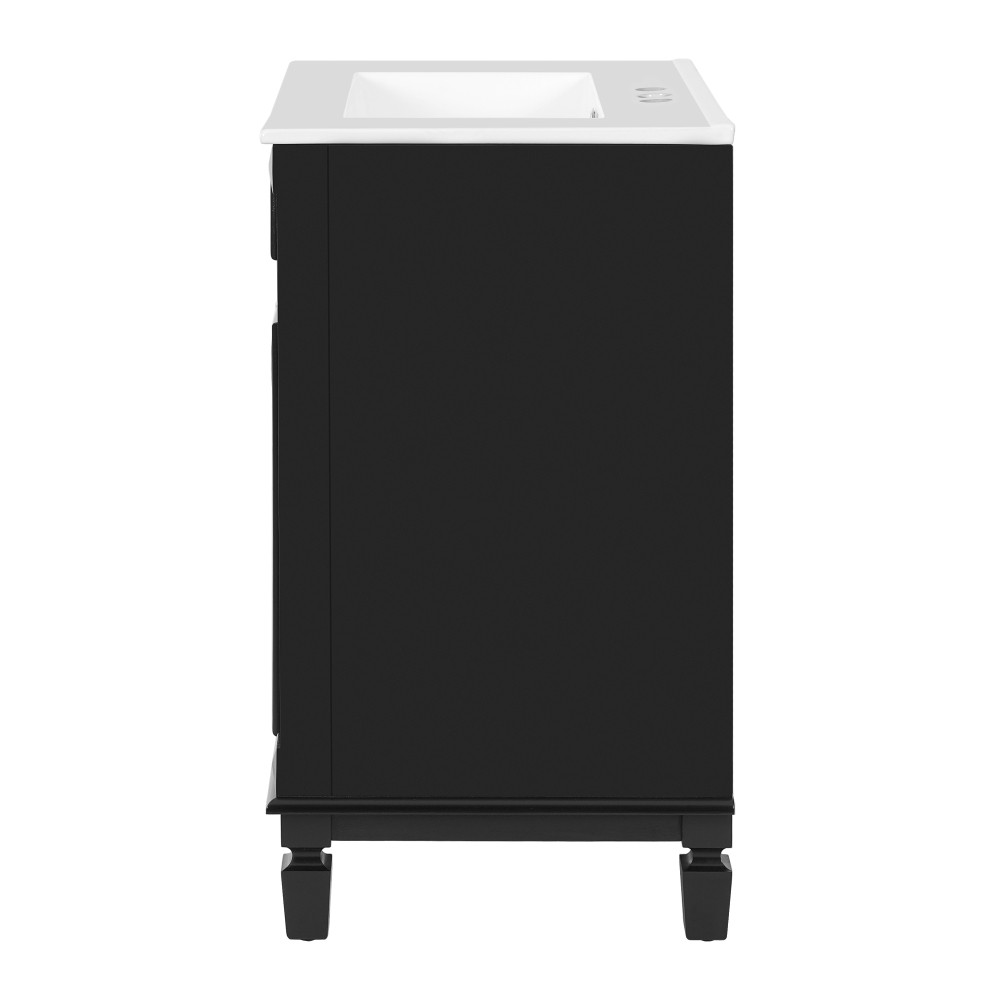Bathroom vanity W ceramic sink Features two drawers Includes adjustable shelves