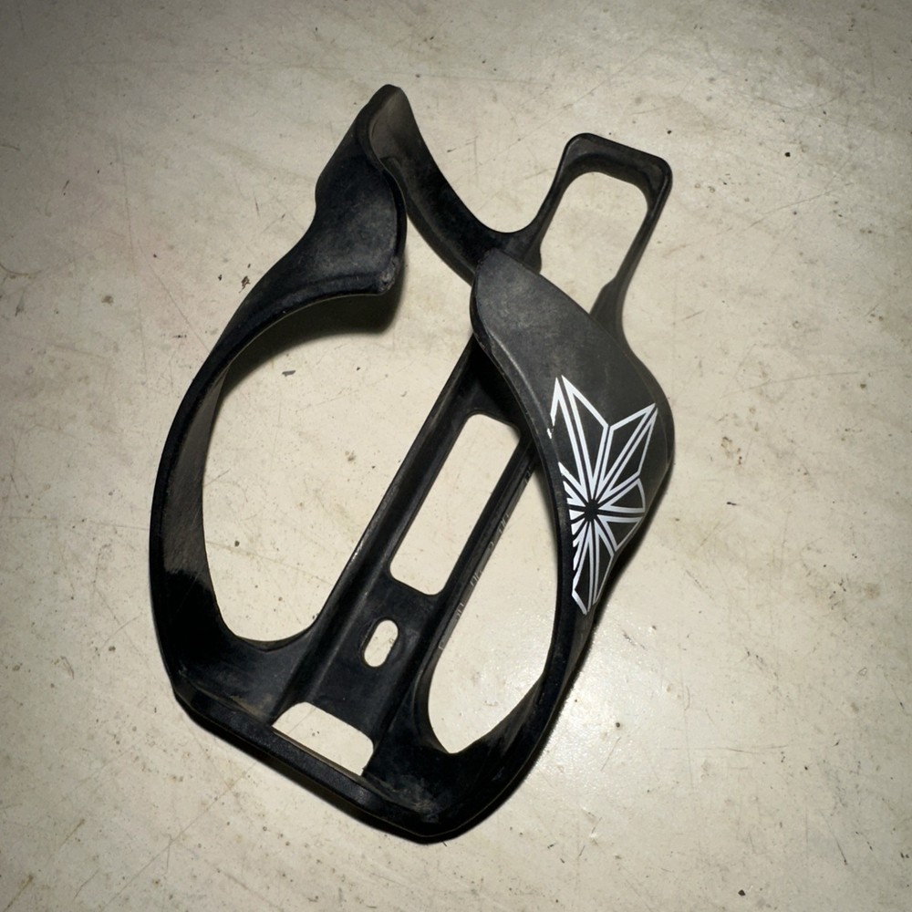 Supacaz Tron Poly Bottle Cage Black Side Loader Right Hand Load White Graphic