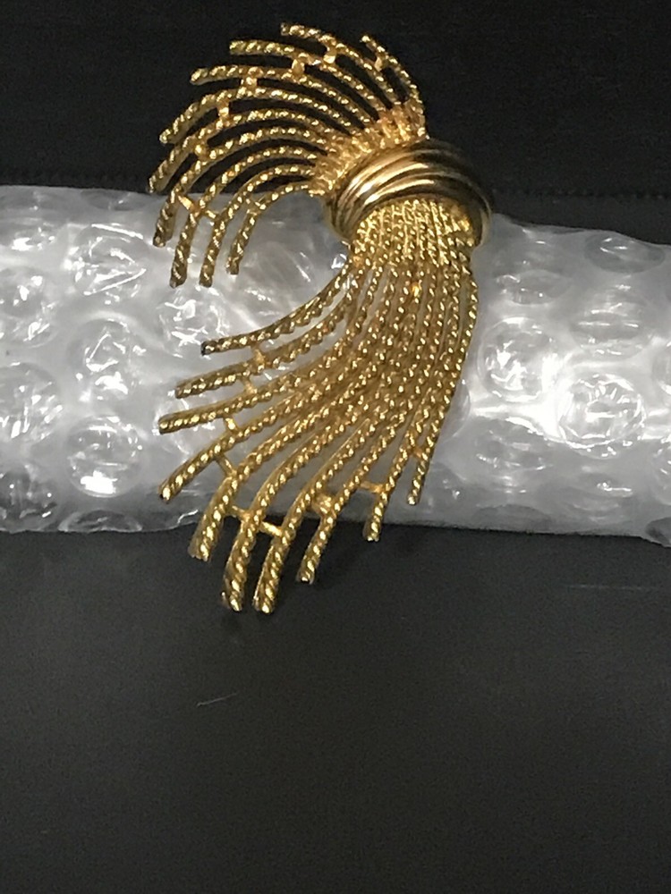 m jent brooch Sign
