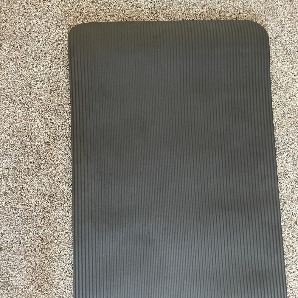 Amazon Basics 1/2-Inch Extra Thick Exercise Yoga Mat with Carrying Straps.