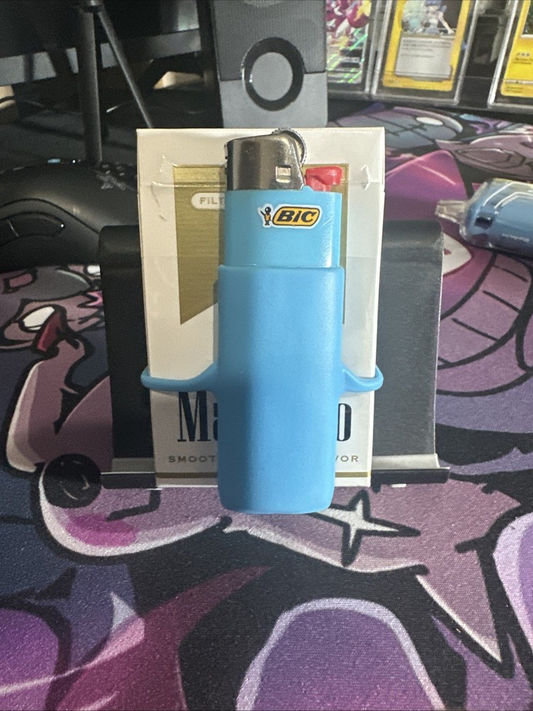 Black Lighter Holder Goes Around Cigarette Pack