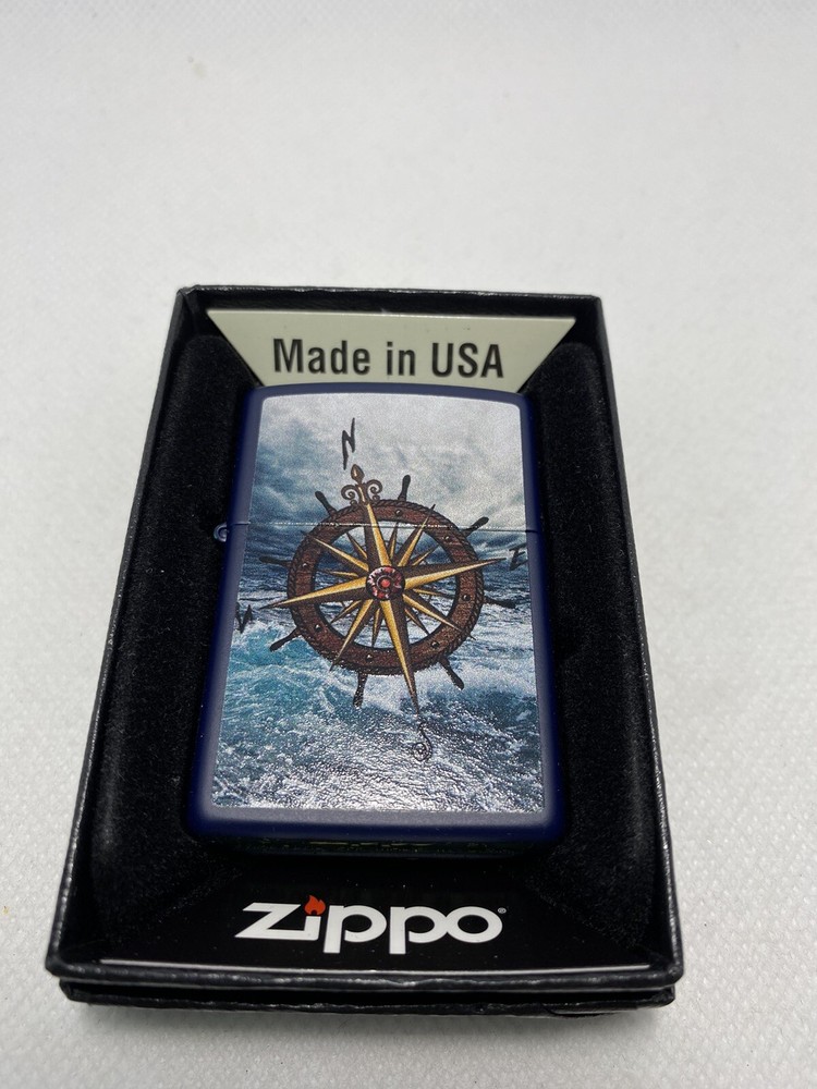 Zippo Compass On A Navy Blue Lighter