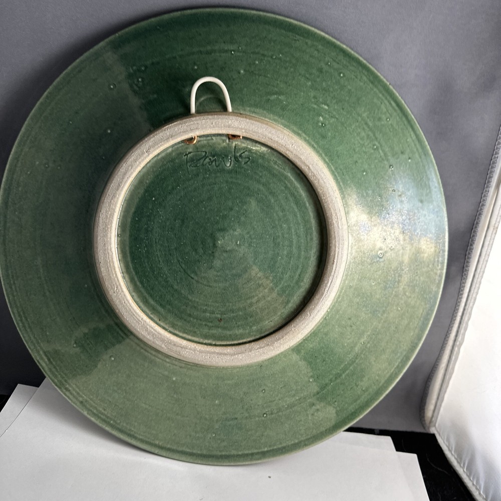 Quality pottery serving plate signed R aWLS￼