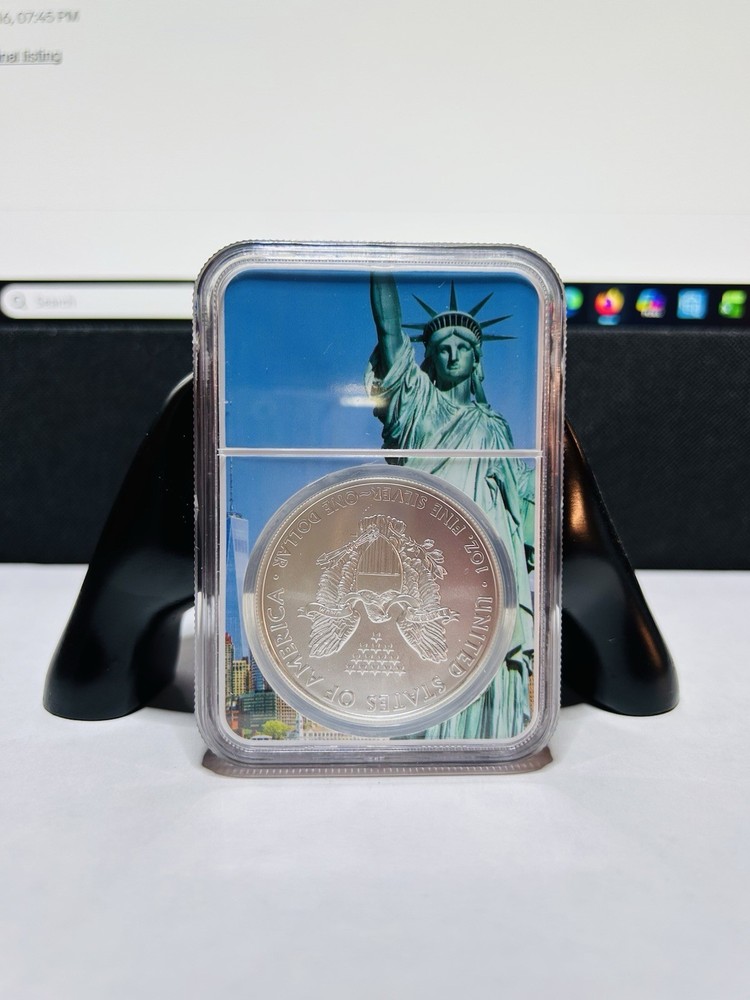 2009 SILVER EAGLE S$1 MS69 NGC