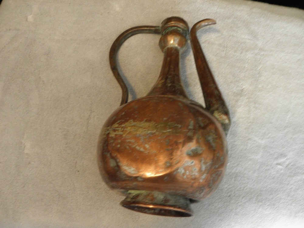 Vintage or antique copper jug