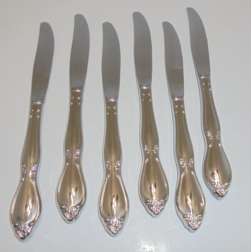 6 Oneida Community Stainless Chatelaine Dinner Knives