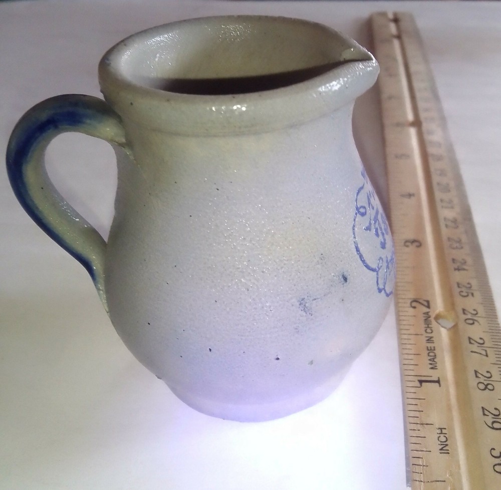 Pottery Creamer says "1813 Jack Amsterdam"
