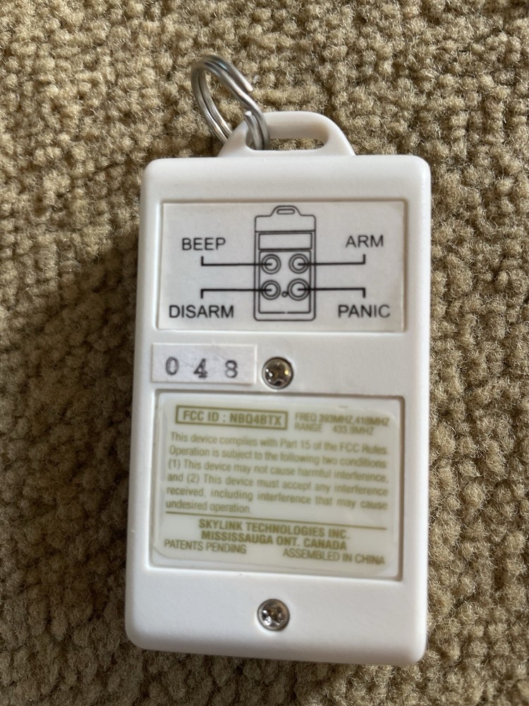 Skylink Wireless Security Keychain Transmitter (4B-434) LOT Of 2 “ Needs Battery