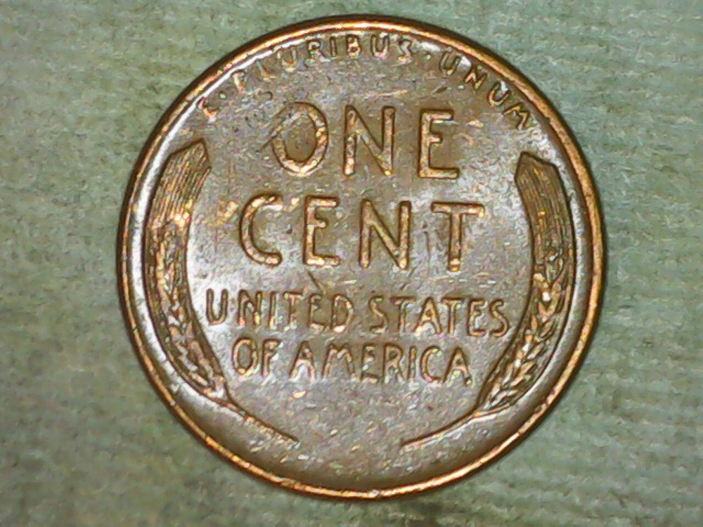 1957-D Wheat Penny Die Chip in "Liberty"