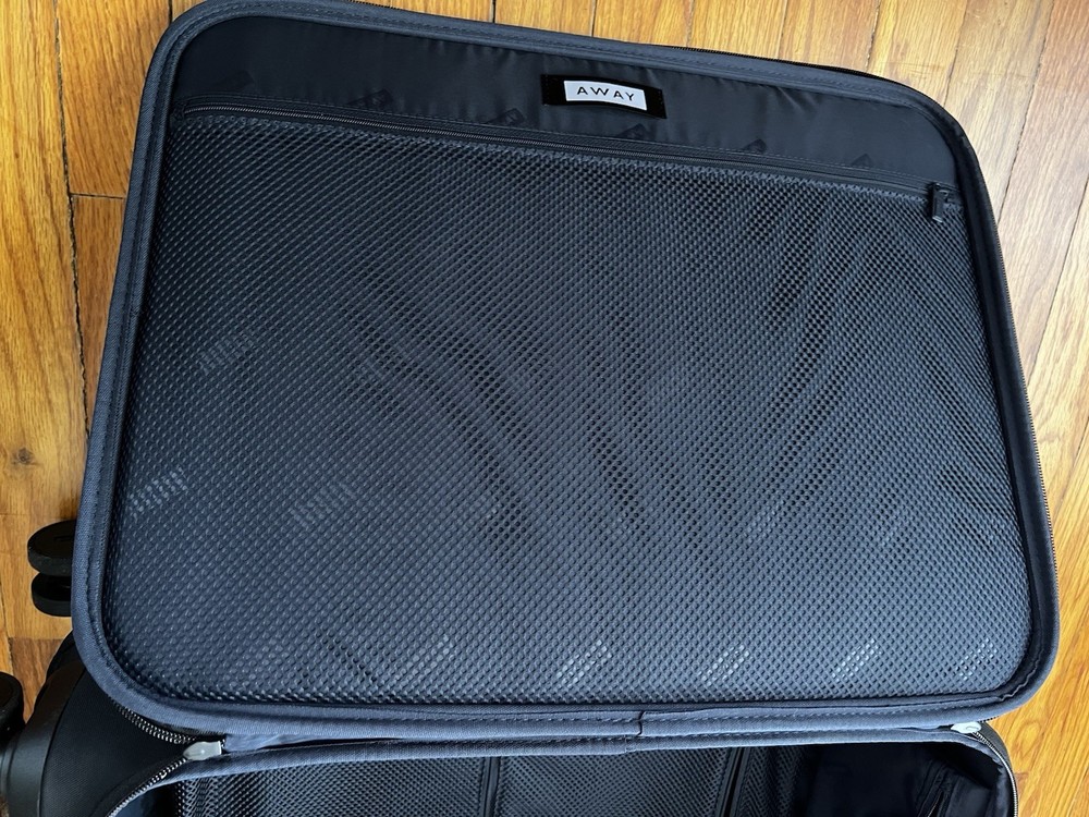 Away Softside flex carry on Expendable Luggage Black