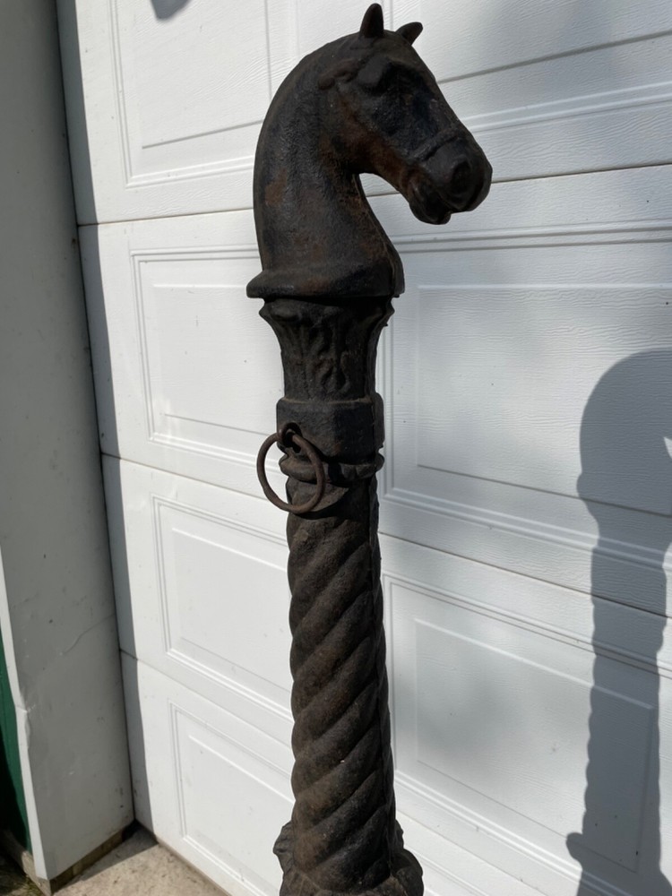 Antique cast iron horse head hitching posts & chain