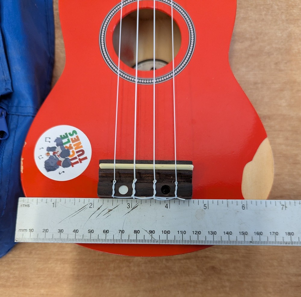 Octopus Soprano Ukulele Red with 4 Strings Includes Case for Beginners