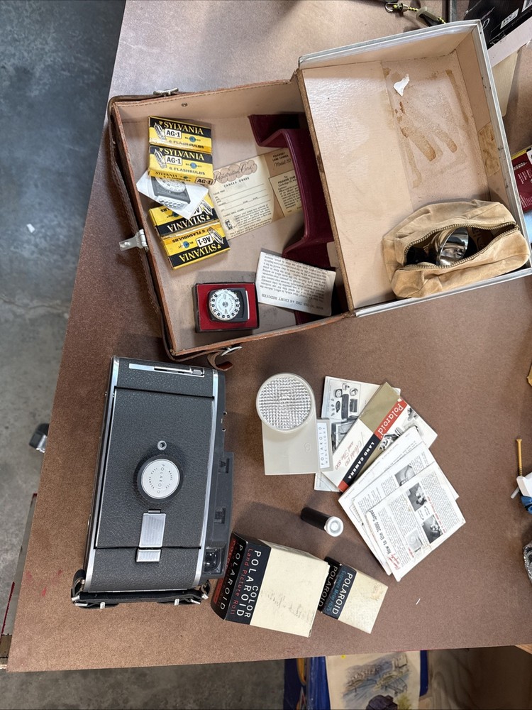 vintage Polaroid Land Camera set includes a camera Model 150 (Case & Accessories