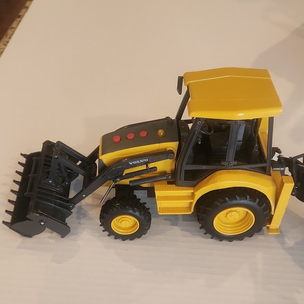 Volvo BL71 Backhoe Loader Plastic Toy Model Yellow Black