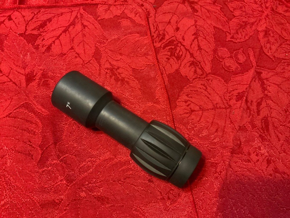 Black 7x spotting scope, no case.