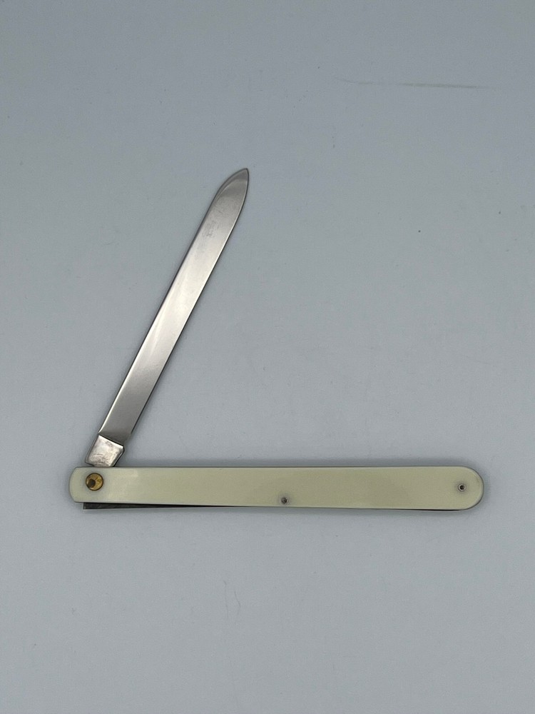 Colonial Straight Folding Knife White Plastic Handle w/ Romro Written On Handle