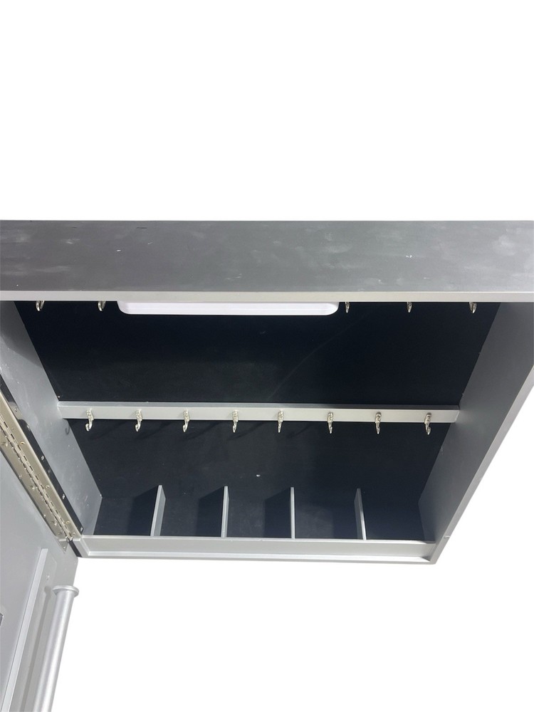 Metal Storage Cabinet with Grid Pattern Front, Hooks, and Compartments