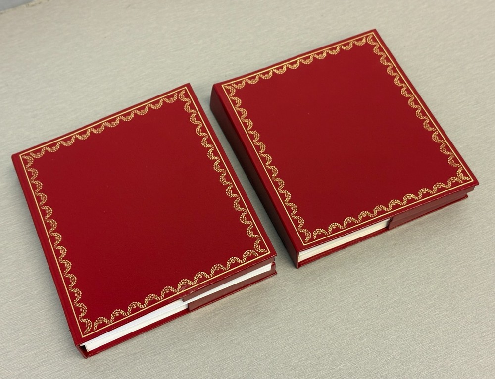 Two Cartier Original Certificate & Instruction Booklet's