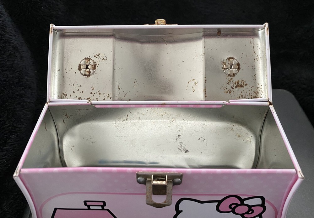 1976, 2012 Sanrio Hello Kitty Tin Box Co. Lunchbox w/ Beaded Handle.