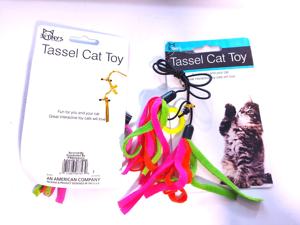 Tiny's group of two multicolored tassel cat toys
