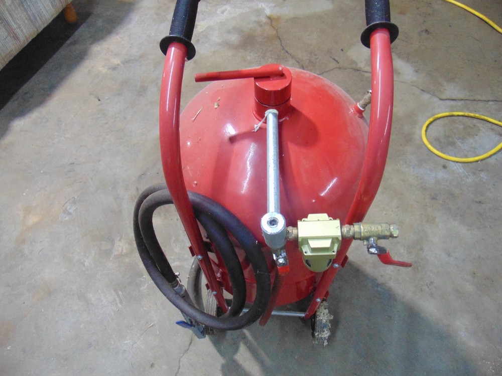 Grip On Pressurized Abrasive Blaster