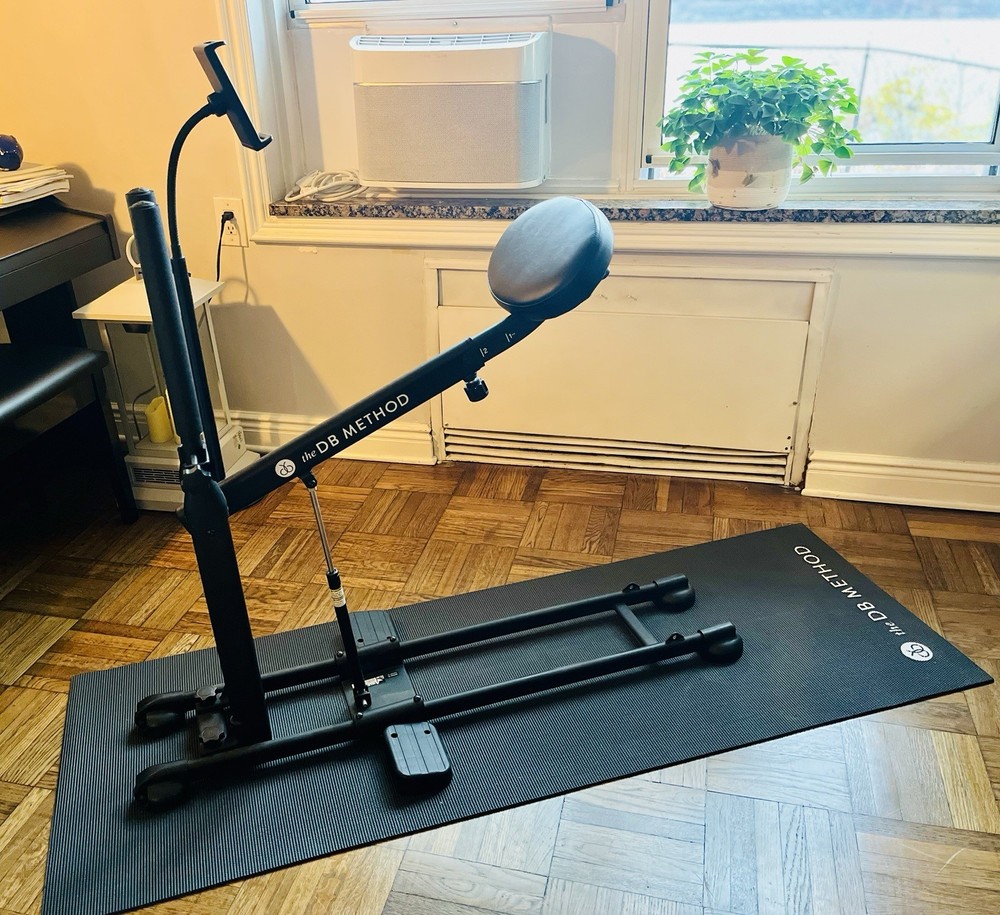 The DB Method Squat Workout Exercise Machine includes a 25lb. weight belt