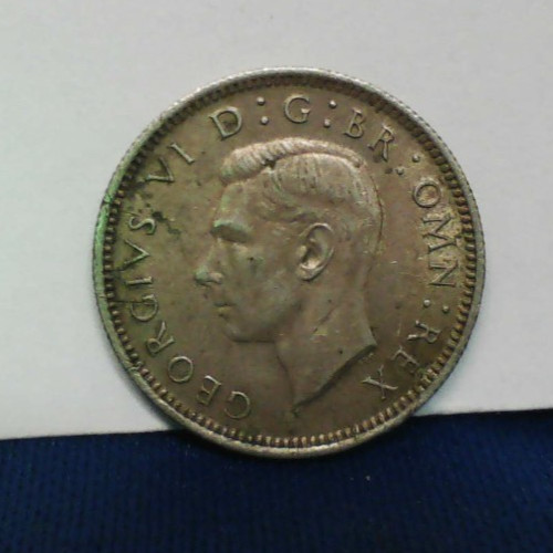 1943 BRITISH SIX PENCE IN VF CONDITION
