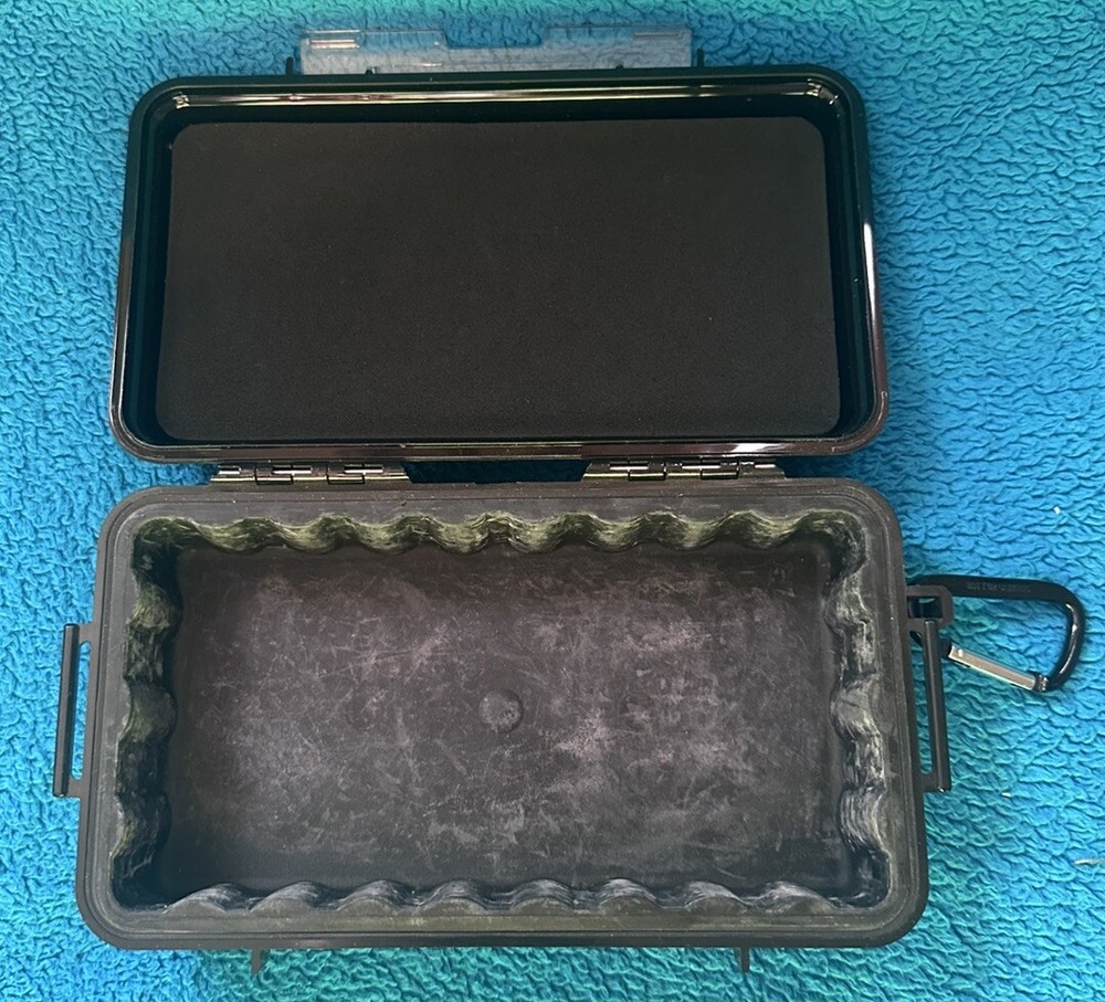 Pelican ™ 1060 Solid Black Micro Case includes Rubber Cushion Insert