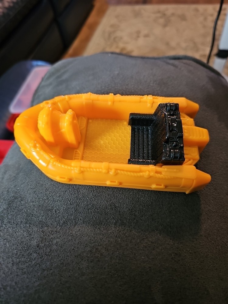 Black And Orange Plastic Boat